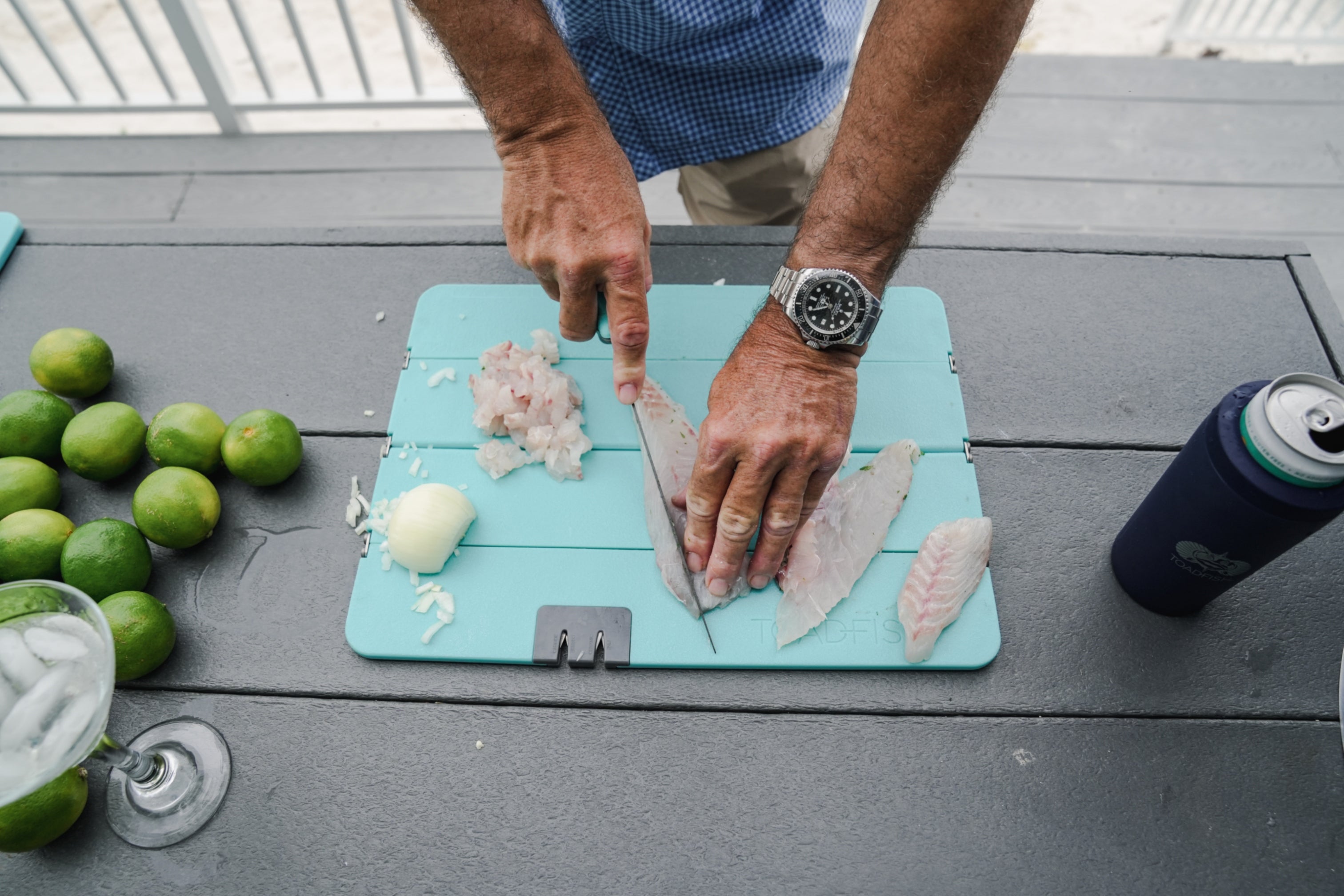 Guy dicing up snapper ceviche