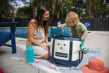 A calm marsh is depicted with a Great Blue Heron wading in it. Above the added text reads 